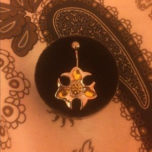 Belly button piercing: hazard symbol