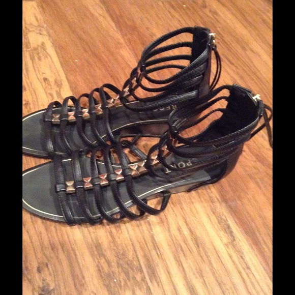 Black and gold gladiator sandals