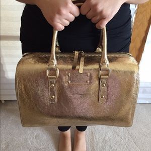 Kate spade metallic gold handbag.