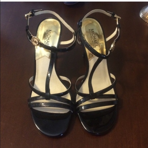 Michael kors black heals with gold accents