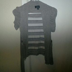 T-shirt with a short sweater attached to it