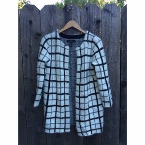 White and black fuzzy coat