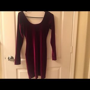 A wine red velvet long sleeve body con dress.