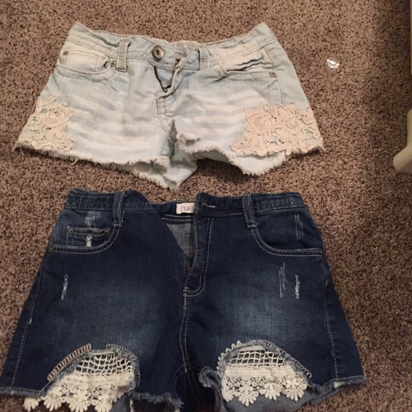 two lace trimmed denim shorts