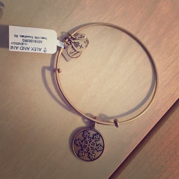 Snowflake gold Alex and Ani bangle.