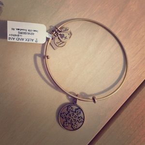 Snowflake gold Alex and Ani bangle.