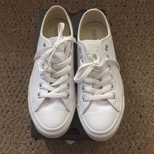 All white low top leather converse