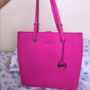 Hot pink Michael Kors jet set travel tote