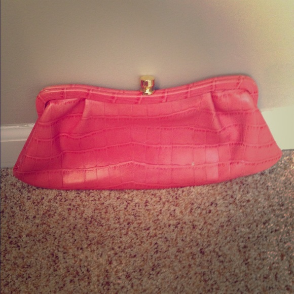 Pink faux leather clutch
