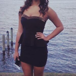 Black peplum dress with gold accents 👗