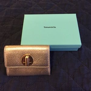 Tiffany & Co. Gold leather wallet.