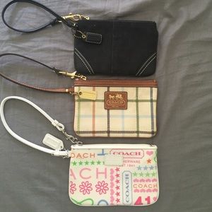 3 Coach wristlets