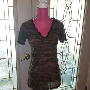 Sheer and silky vneck top with lace border