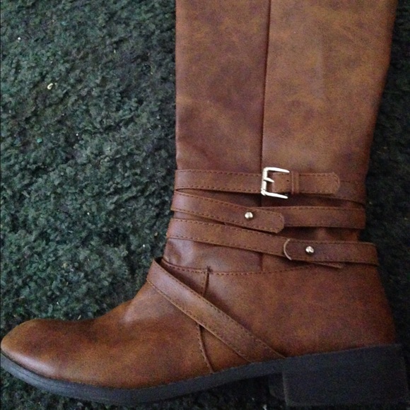 Brown tall boots.