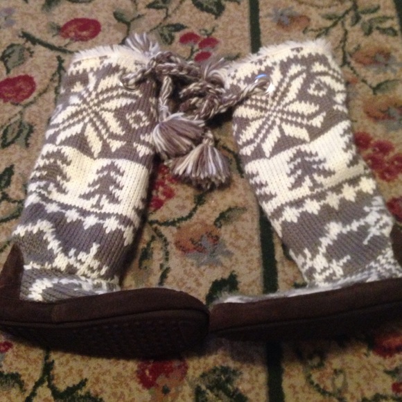 Gray, white, and brown boots.