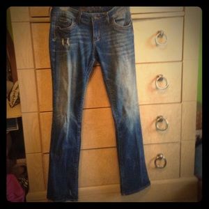 Distressed Straight Legged Jeans
