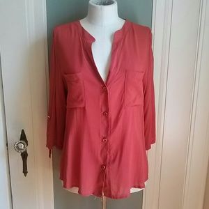 Burnt orange/red top