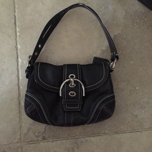 Small Coach black purse.