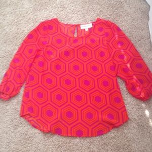 Francesca's pink and orange patterned blouse