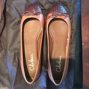 Brown two tone leather Cole Haan flats.