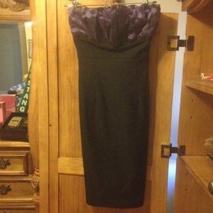 Tight black knee length dress