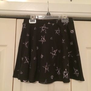 Black skater skirt with white stars