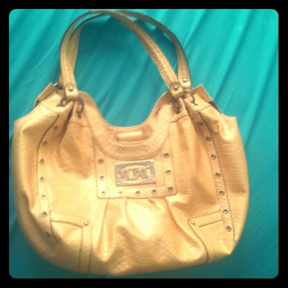 Yellow purse xoxo
