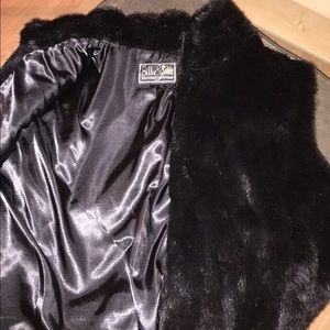 Faux fur jacket-vest.