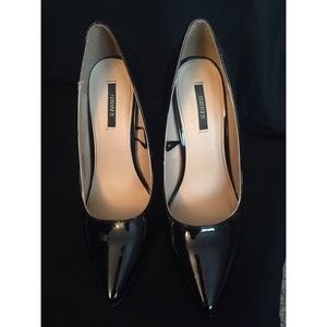 F21 Size 7 Black Pointed toe Heels.