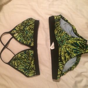Green and blue nike swim suit