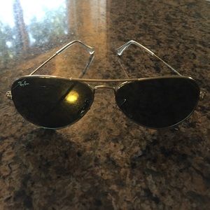 RayBan Aviators w/ dark tinted lenses & gold frame
