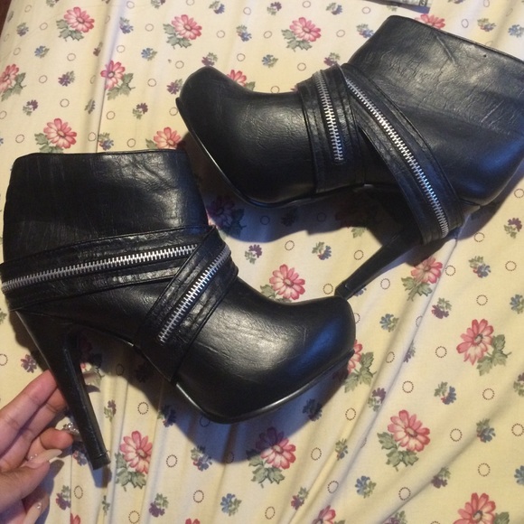 Black heels with zippers