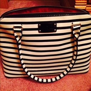 Large Kate Spade handbag with dust cover.