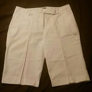 Bermuda length white shorts