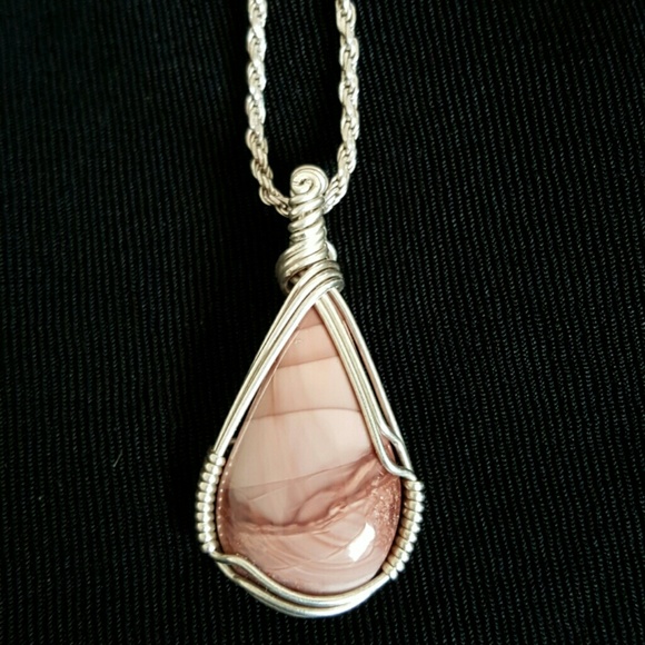 Stone wire wrapped pendant.