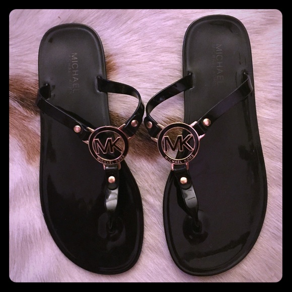 Michael Kors black sandals with gold detailing