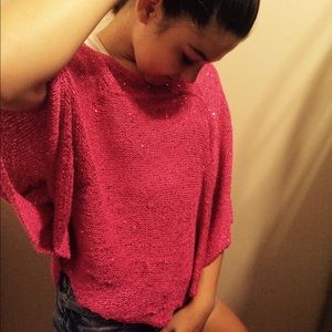 Pink sparkly justice poncho