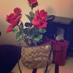 Coach signature handbags