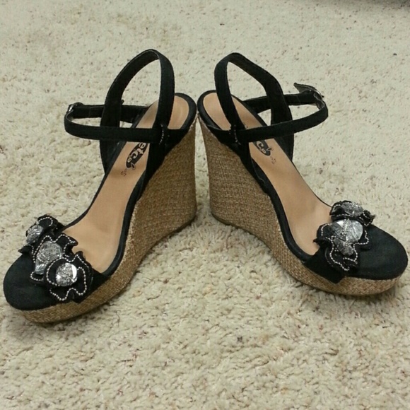 Black Jeweled wedge sandals.