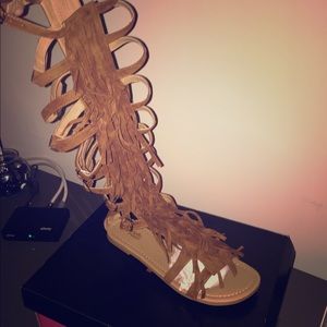 Tall fringe sandals