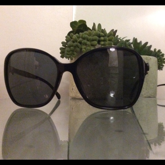 Black Chanel bow sunglasses