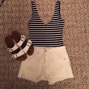 Low cut navy and white striped bodysuit