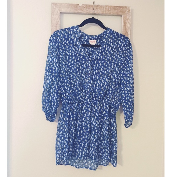 Sheer flowy blue top with white little birds