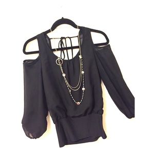 Black Top with Peek A Boo shoulder cut offs !