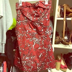 Red strapless dress. Pair it with a belt too