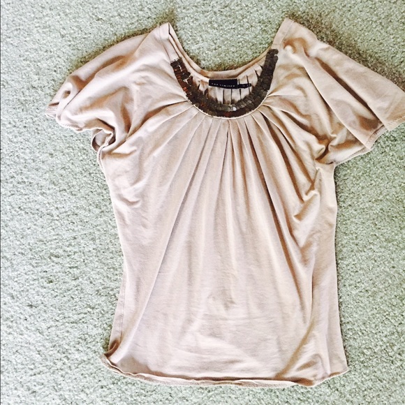 Beige pleated top with metallic neckline detail