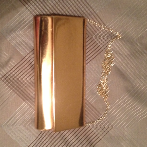 A golden bronze clutch/purse