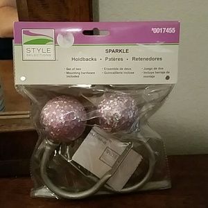 Pink and silver sparkle curtain hold backs