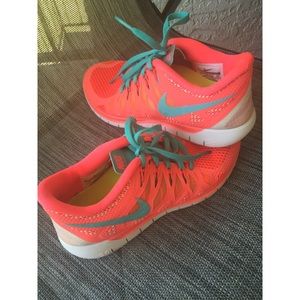 Coral Nike Free Runs