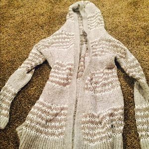 A grey stripped cardigan